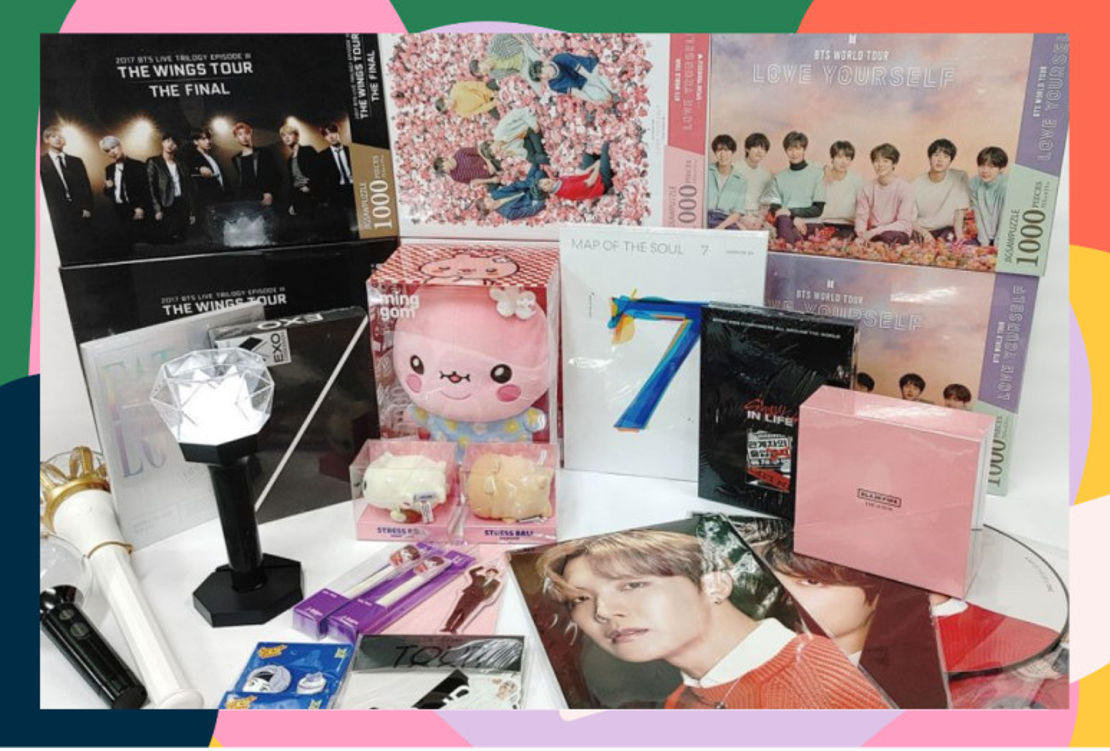 must have items as a kpop fan like lightstick, photocrds and albums in a funky frame 